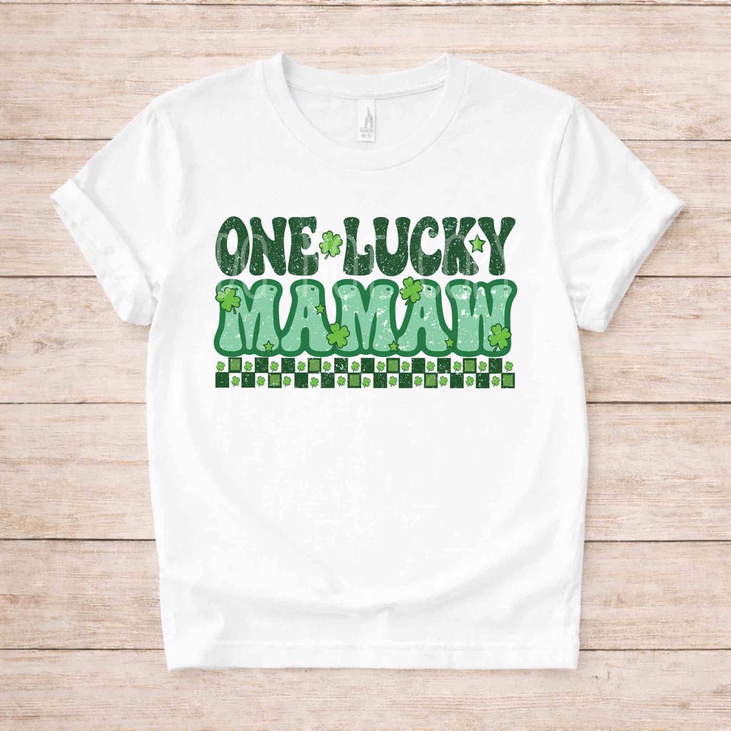 St. Patricks Day matching tee with retro lettering and shamrock details, perfect for family celebrations.