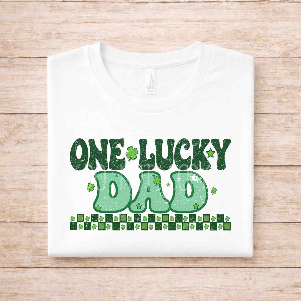 St. Patricks Day One Lucky Dad tee with festive green lettering and shamrock accents