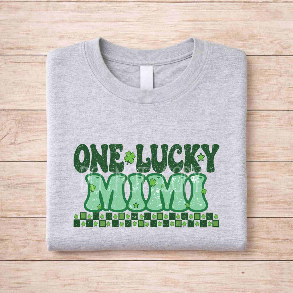 St. Patricks Day One Lucky Mimi shirt with retro green lettering and shamrock accents on a gray tee.