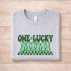 St. Patricks Day One Lucky Mimi shirt with retro green lettering and shamrock accents on a gray tee.