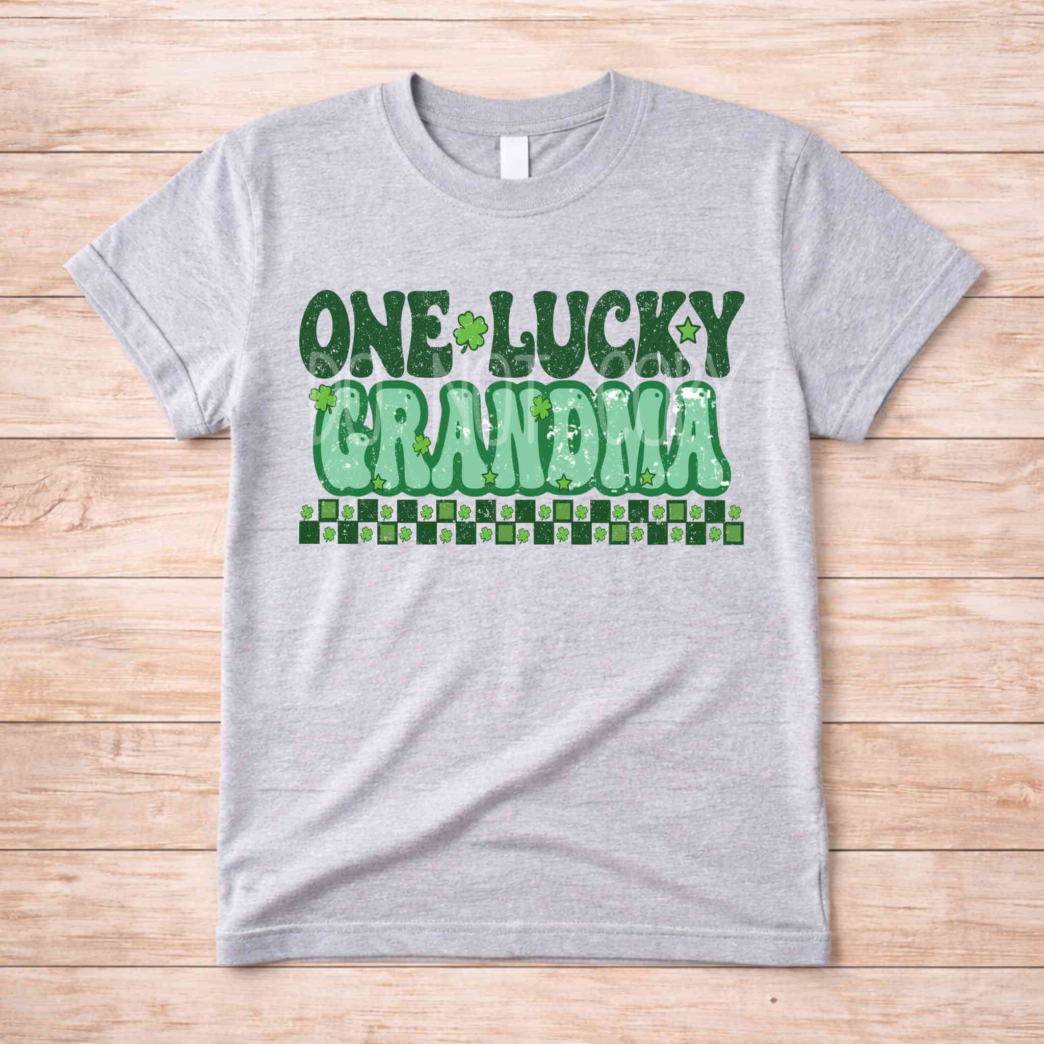 St. Patricks Day matching tee shirt featuring retro green lettering saying One Lucky Grandma.