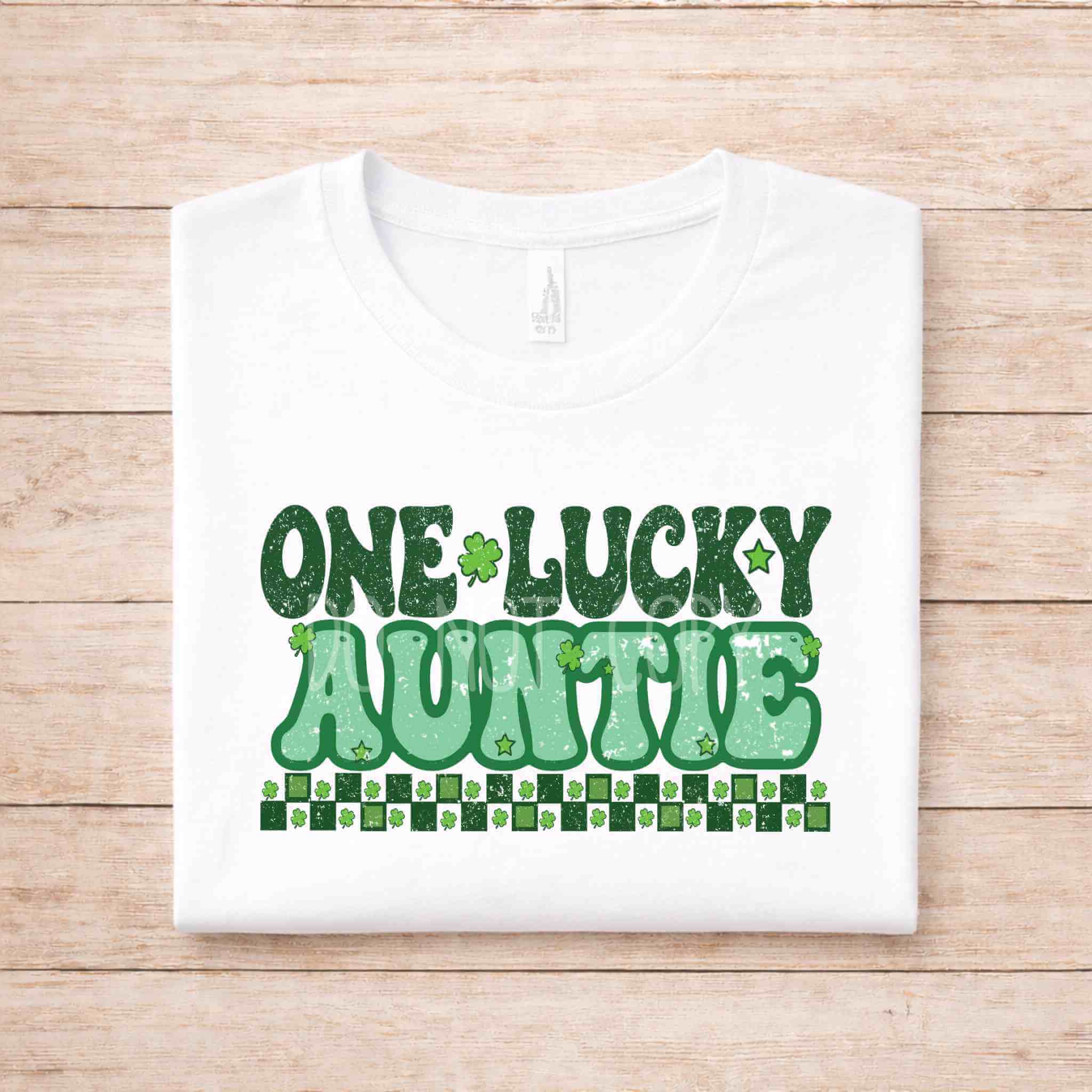 St. Patricks Day One Lucky Family shirt featuring retro lettering and shamrock details on a white tee.