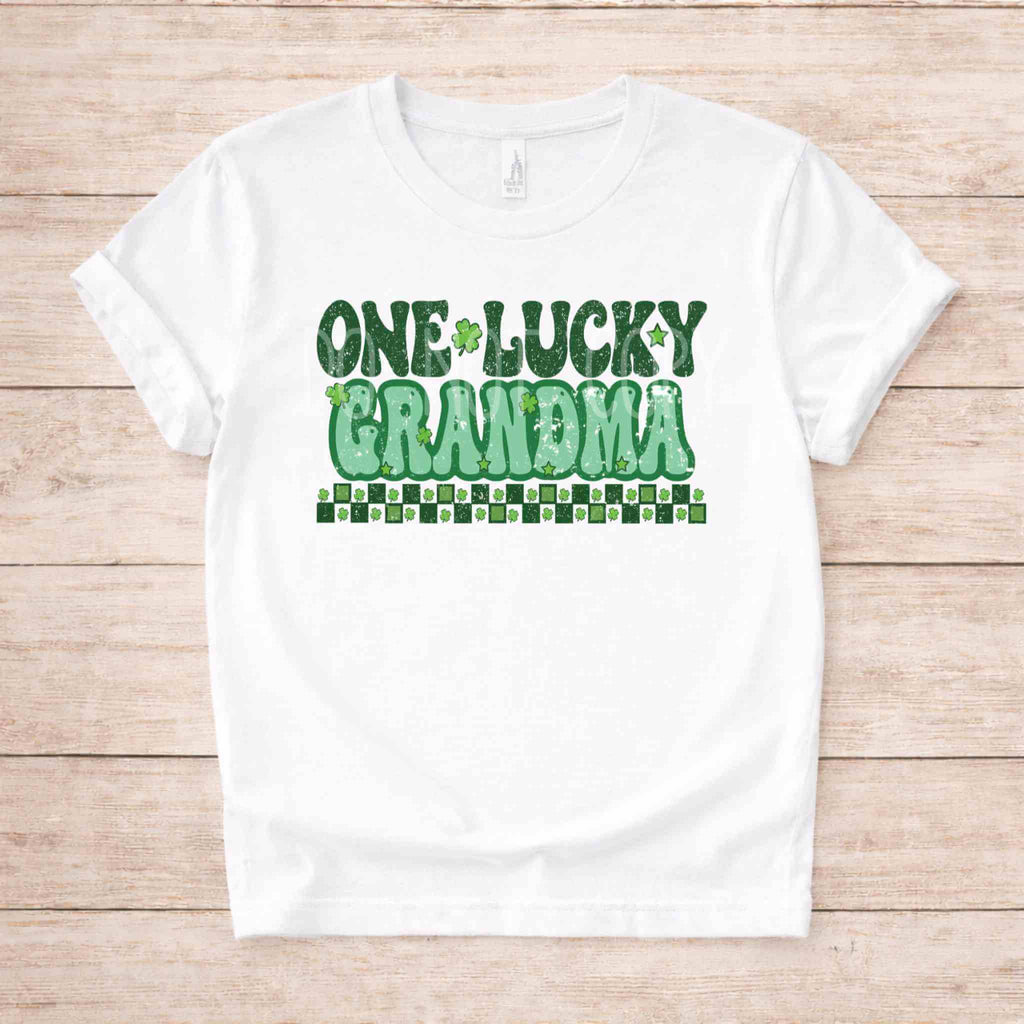 St. Patricks Day One Lucky Grandma t-shirt with retro green lettering on a white background.