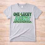 St. Patricks Day One Lucky Aunt T-shirt featuring retro lettering and shamrock accents.