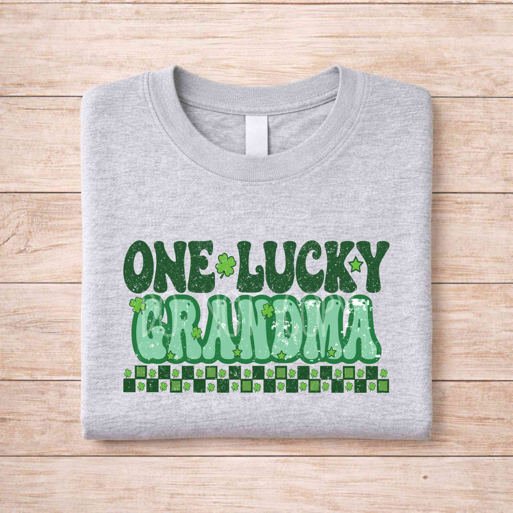 St. Patricks Day matching tee featuring retro lettering for One Lucky Grandma on a gray shirt.